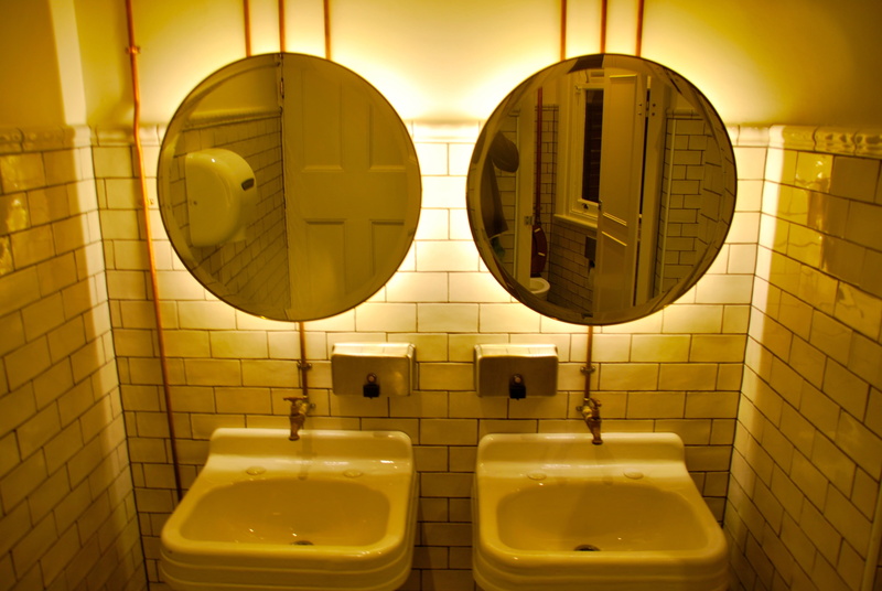 modern, tiled floor, wall, urinal, two, flooring, lights, public restroom, framed, wall - building feature, house, mirror, metal, round, cleaning, domestic Bathroom