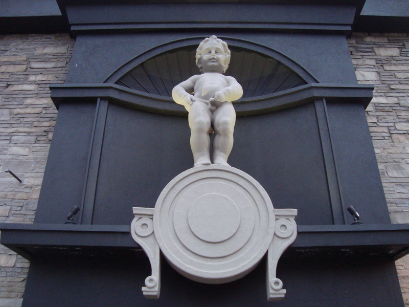 child, built structure, art and craft, sculpture, statue, angel, carving - craft product, fine art statue, urinating, architecture, history, female likeness