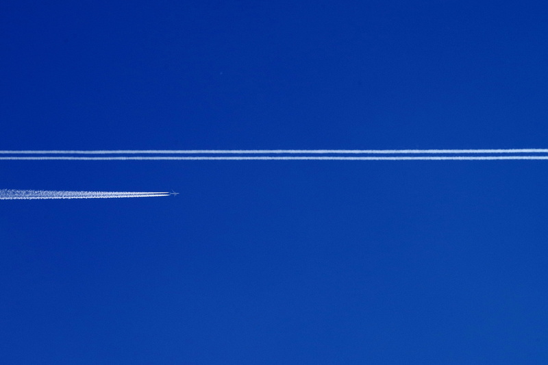 travel, motion, on the move, plane, airplane, sunny, contrail, emission nebula, aerospace industry, vapor trail, blue, no people, sky, air vehicle, smoke - physical structure