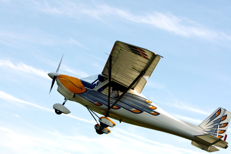 on the move, flyer, plane, public transportation, airpower, outdoors, air vehicle, aviation, airplane, motion, double decker, flying, yellow, cloud - sky