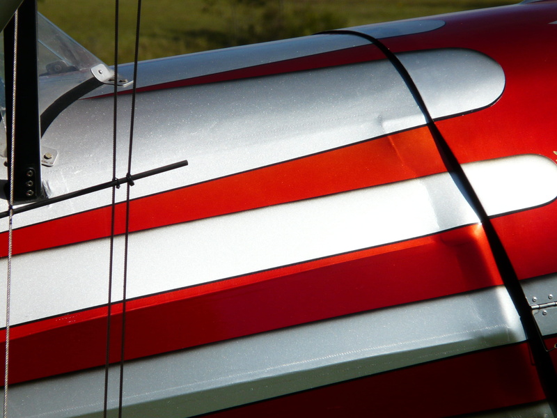 day, striped, car, communication, aerobatics, white color, transportation, red, aircraft, city, 2K, pattern, reflection, close-up, land vehicle, sign