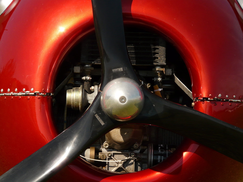 cockpit, 2K, wheel, machinery, no people, geometric shape, metal, airplane, mode of transportation, motor vehicle, transportation, old-fashioned, day