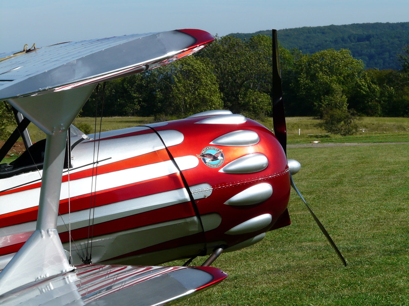 tree, start, mode of transportation, land vehicle, Propeller, sunlight, car, motor vehicle, transportation, sport, day, outdoors, M17, silver, field, Aerobatics