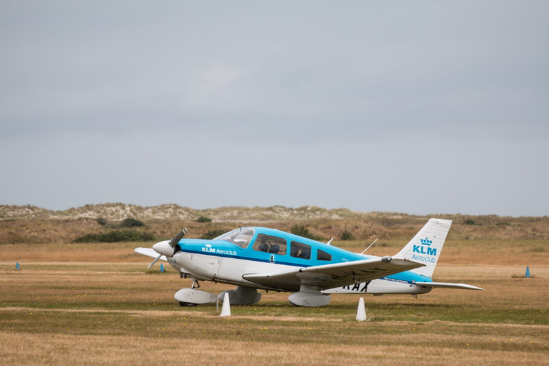 land, aircraft, military, nature, waters, day, transportation, airport runway, sun, aerospace industry, propeller, plane, m17, propeller plane, beach, sea