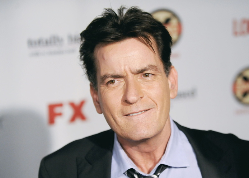 one person, charlie sheen, s, males, businessman, office, hairstyle, black, 2K, mature adult, focus on foreground, business person, mature men, blazer