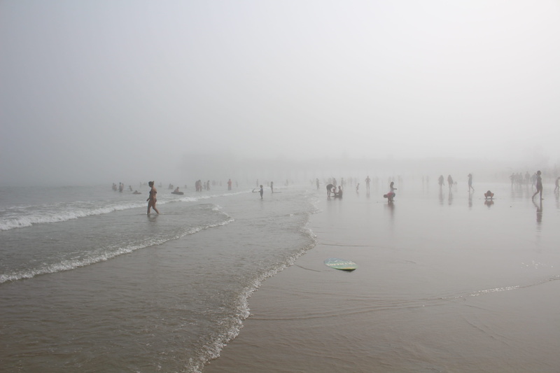 outdoors, people, lifestyles, fog, activity, sky, hazy, ocean, sport, waterfront, scenics - nature, swimming, foggy, group of people, vacation, real people
