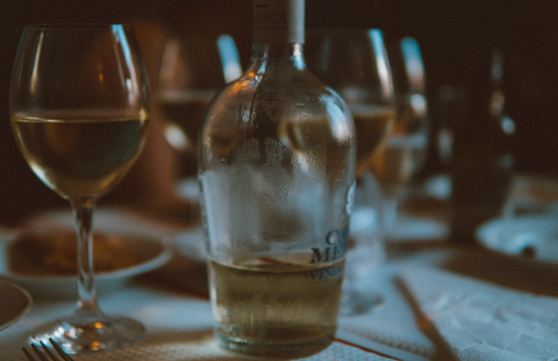 bar counter, furniture, glass - material, beer, container, goblet, still life, wine glass, drink, wineglass, food, pub, household equipment, half, indoors