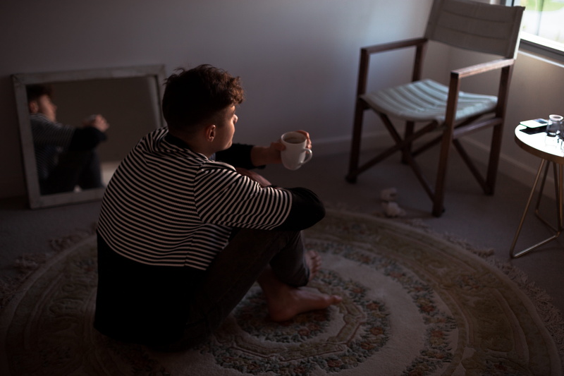 home Interior, window, coffee, caucasian Ethnicity, drink, food and drink, side view, mug, sitting, one man only, drinking, adult, technology, floor, man