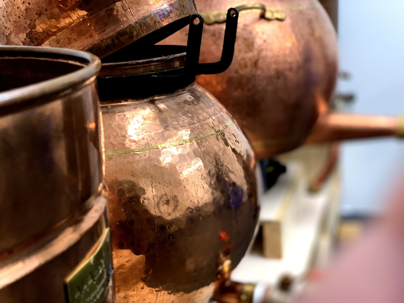 alcohol, gin, liquor, kitchen utensil, pottery, jar, metal, selective focus, no people, household equipment, drink, still life, close-up, alcoholic, distillation