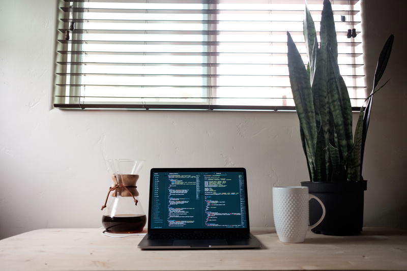 desk, chair, workspace, refreshment, glass - material, indoors, near, no people, day, white, glass, drinking glass, beside, food and drink, mug, still life
