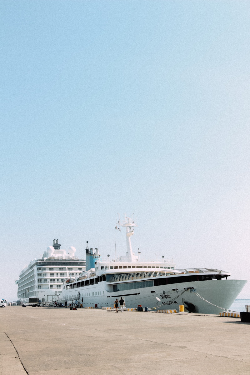 vehicle, human, body, person, airport, port, waterfront, military, india, sky, watercraft, airport runway, boat, air vehicle, incidental people, water