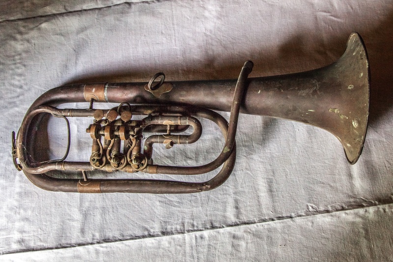 music, day, no people, sound, gray, wall - building feature, brown, creativity, weapon, brass, forgotten, art and craft, instrument, metal, wind, still life