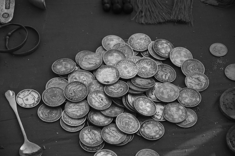 finance and economy, no people, fisheye, dish, high angle view, silver, currency, large group of objects, arrangement, savings, metal, money, clock tower