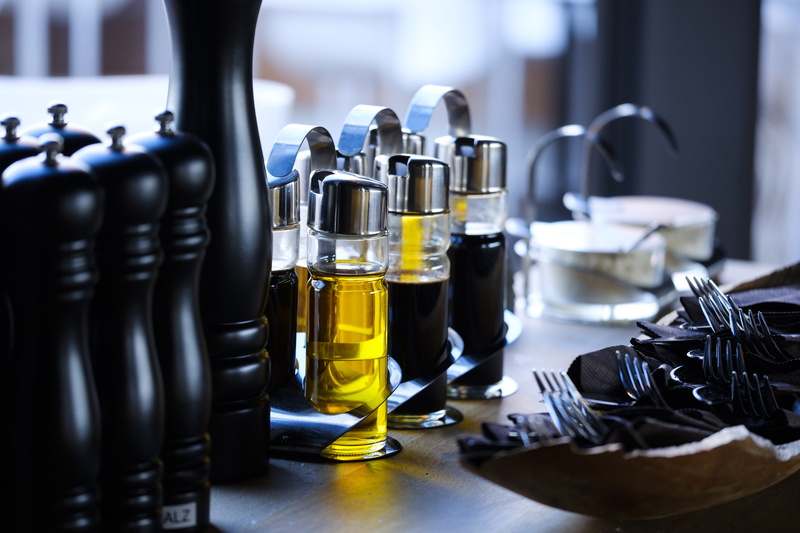 no people, food and drink, restaurant, refreshment, side by side, oil, pepper, preparation, table, still life, drink, large group of objects, container