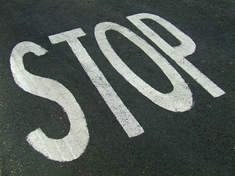 no people, attention, message, white color, white, highway, street, road, black color, caution, warning, road marking, warning sign, signage, symbol, marking
