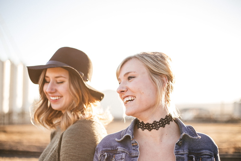 laughter, portrait, woman, friend, selfie, standing, laugh, sunlight, hat, gray, curly, young adult, taking, smile, positive emotion, hair, beside, denim