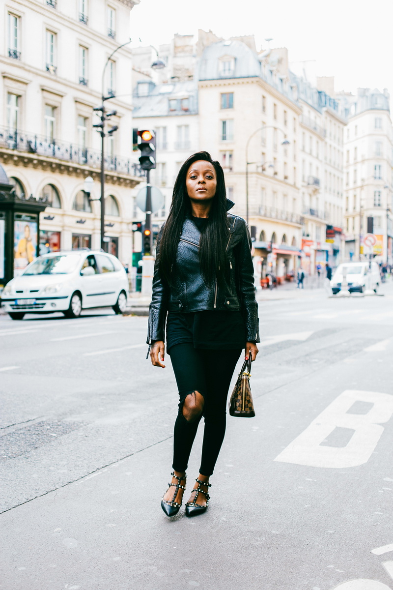 buildings, beautiful woman, wear, fierce, facial expression, one person, glamour, woman, city, casual clothing, road, young women, full length, cars, looking