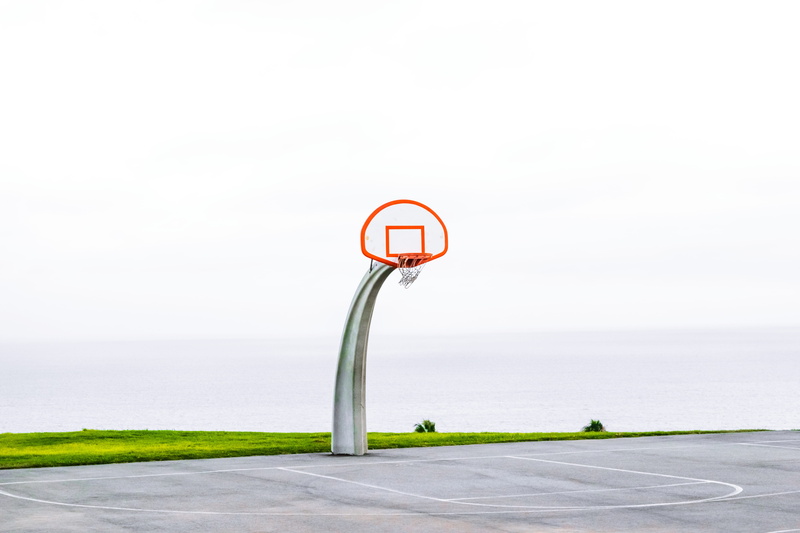outdoors, basketball court, architecture, horizon, team, water, 5K, red, sky, grass, horizon over water, team sport, street, no people, day, play area
