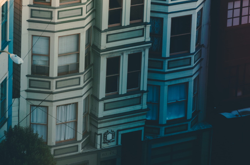building exterior, full frame, san francisco, outdoors, no people, glass - material, building, pattern, curtain, row house, low angle view, edge, urban