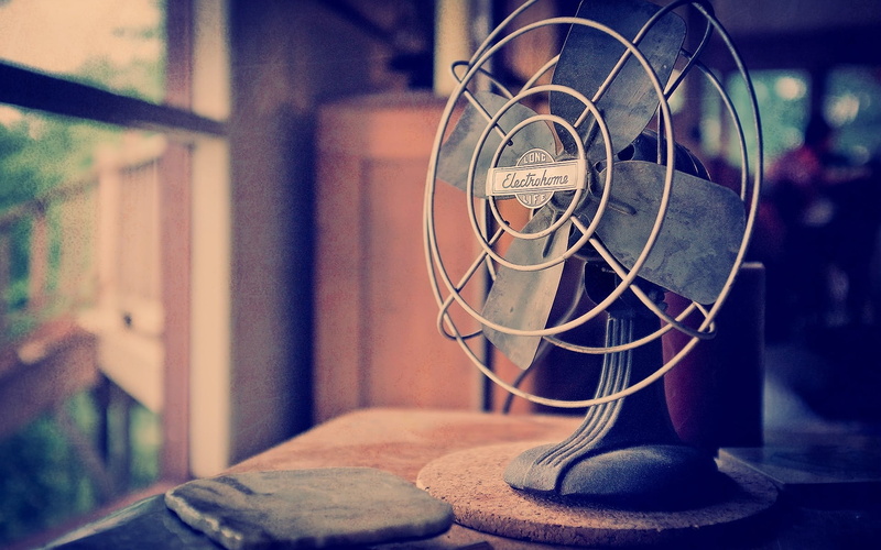 device, metal, day, focus on foreground, wood - material, still life, table, blade, retro Styled, box, window, old, outdoors, black, close-up, ventilator