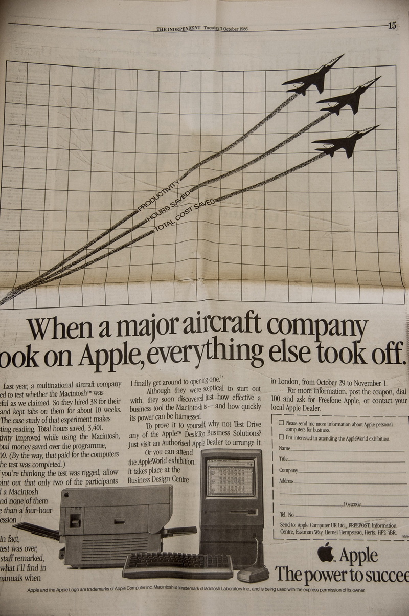 2K, transportation, outdoors, apple, Advert, finance, vintage, building, no people, business, air vehicle, composite image, city, built structure, british