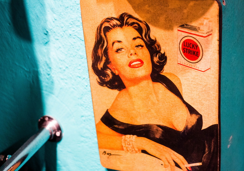 hair, advert, indoors, spain, females, headshot, barcelona, mural, waist up, cigarettes, retro ad, hairstyle, mid adult, beautiful woman, lucky strike