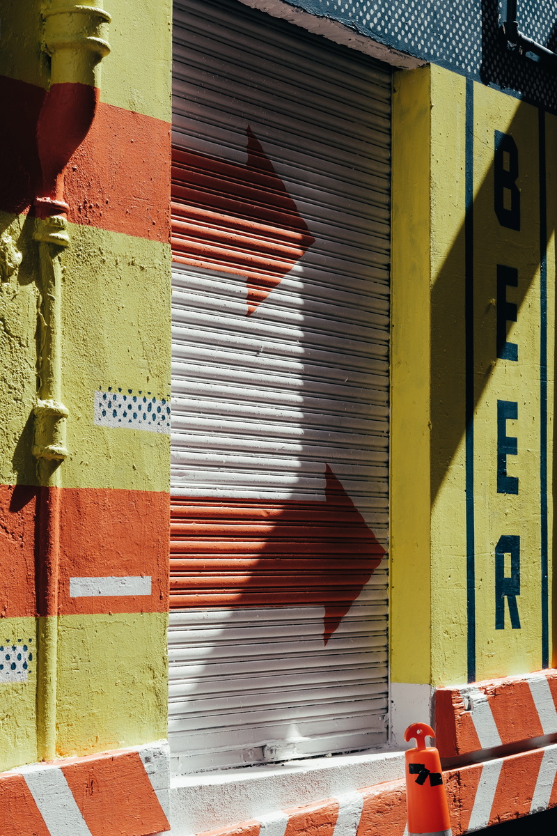 bicycle, curtain, outdoors, protection, building, red, xt2, yellow, corrugated iron, bike, detail, day, sunlight, handrail, window shade, sign, home decor
