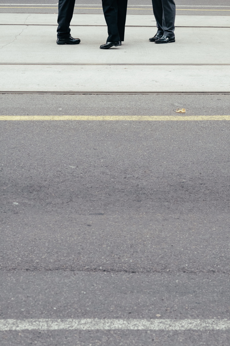 melbourne, symbol, color, human foot, human body part, footpath, floor, few, three, outdoors, stepping, standing, line, city, near, day, human leg, real people