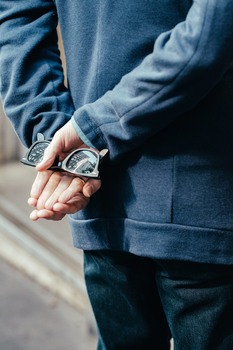 currency, jeans, adult, 90mmfujinon, detail, fujifilm, man, sweatshirt, outdoors, behind back, one person, city, reflection, framed, ban, men, casual clothing
