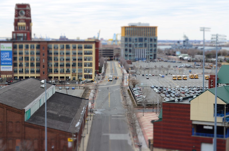 car, city, no people, architecture, residential district, shoreline, built structure, road, building exterior, transportation, boats, cityscape, building