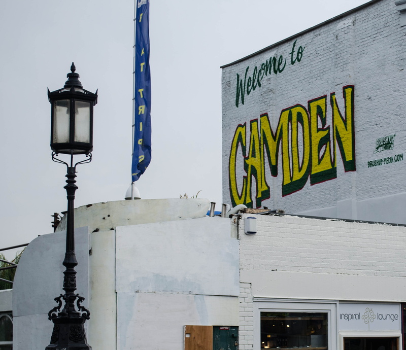 city, architecture, low angle view, day, nature, outdoors, wall - building feature, lighting equipment, electric lamp, camden town, communication, building