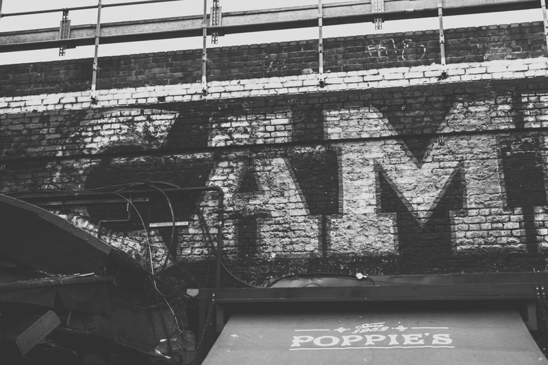 wall - building feature, western script, sign, sunlight, london, camden, communication, 2K, day, information, graffiti, nature, built structure, bridge