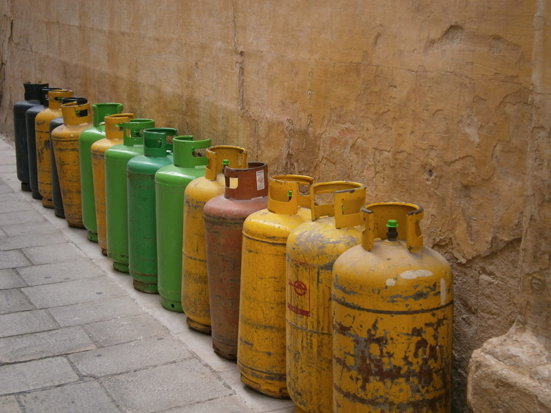 tank, in a row, variation, cylinder, built structure, green color, container, no people, group of objects, canister, gas bottle, footpath, 2K, assorted