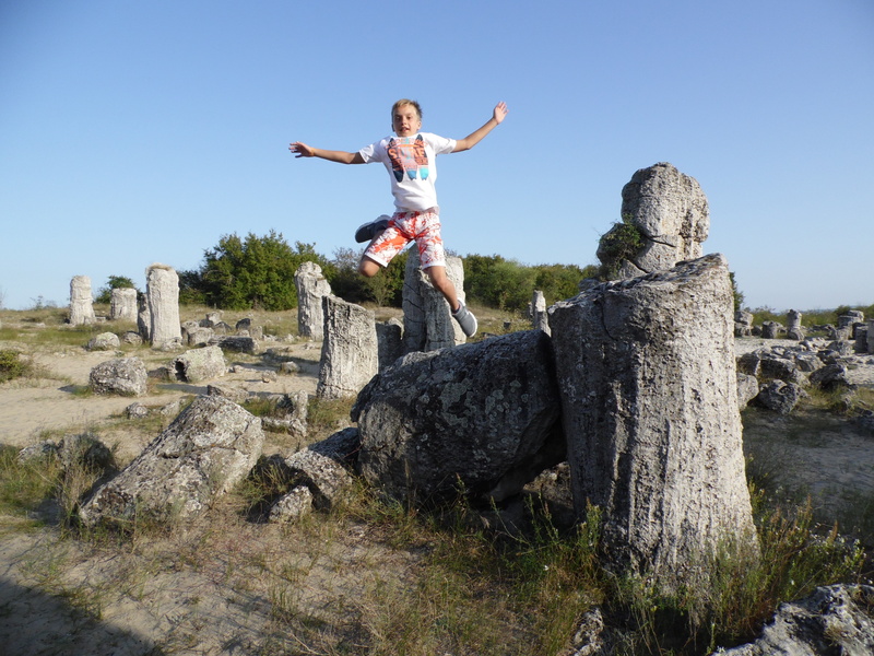 human limb, arms raised, nature, human arm, real people, sunlight, arms outstretched, leisure activity, lifestyles, full length, fun, standing, outdoors