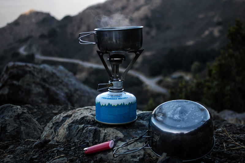 pan, selective, burning, day, equipment, container, camp stove, gas, drink, outdoors, burner, land, cooking, mountain, cliff, geology, camping, butane