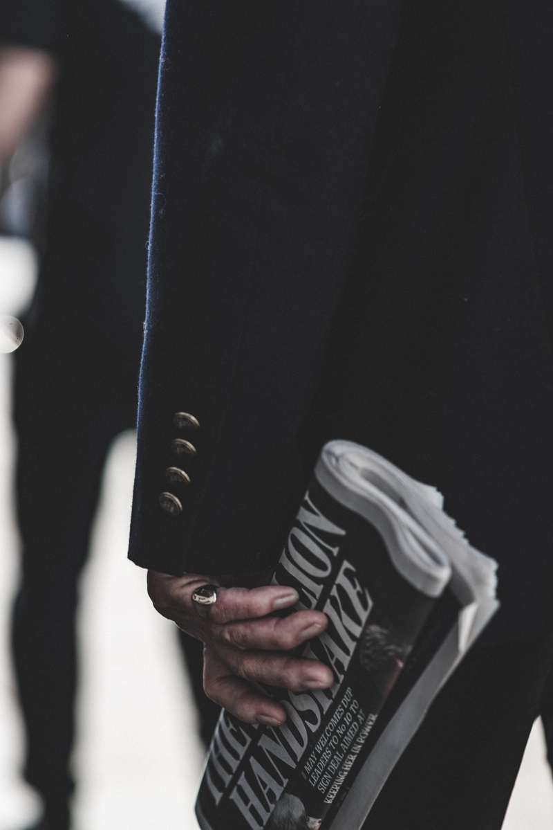 ring, close-up, newspaper, black color, finger, 5K, street, aggression, hand, london, holding, news, old, black and white, midsection, human body part