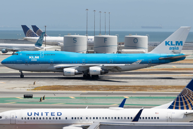 stationary, travel, sky, in a row, airport departure area, airplane, aircraft, white, water, no people, transportation, commercial airplane, nautical vessel