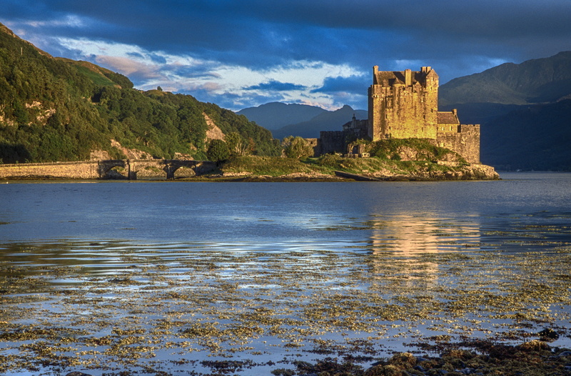 eilean donan castle, shoreline, building, cloud - sky, concrete, no people, moat, sea, ocean, built structure, fort, rugged, beside, eilean donan, water