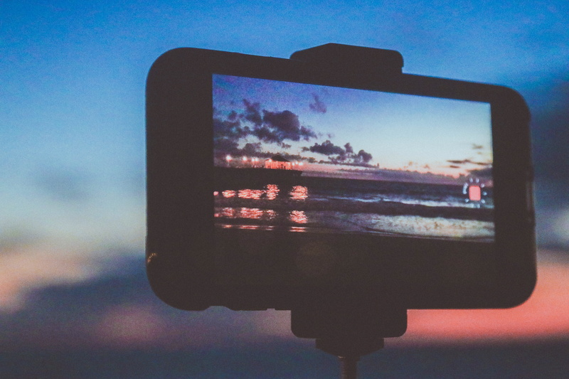 united states, illuminated, portable information device, golden hour, beach, 5K, communication, sunset, through the phone, the pier, focus on foreground