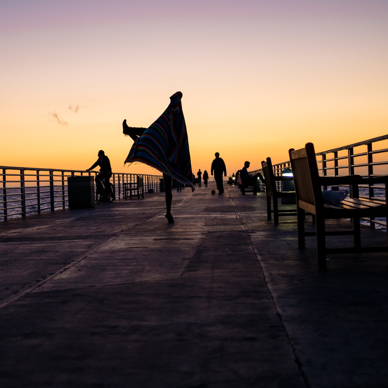 pose, lifestyles, united states, direction, sea, sky, women, dance, outdoors, group of people, silhouette, sunset, nature, men, orange color, leisure activity