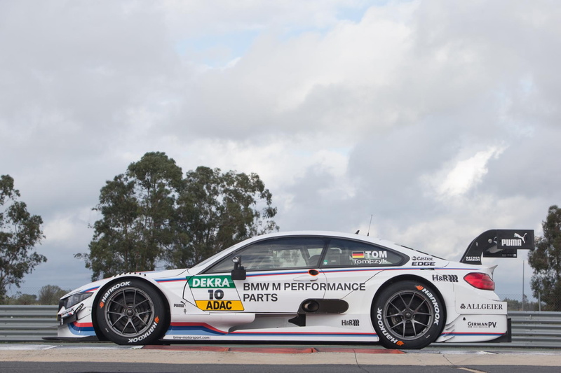 sky, racecar, outdoors, no people, communication, speed, cloud - sky, sports race, number, bmw, text, land vehicle, racer, m, auto racing, motor vehicle