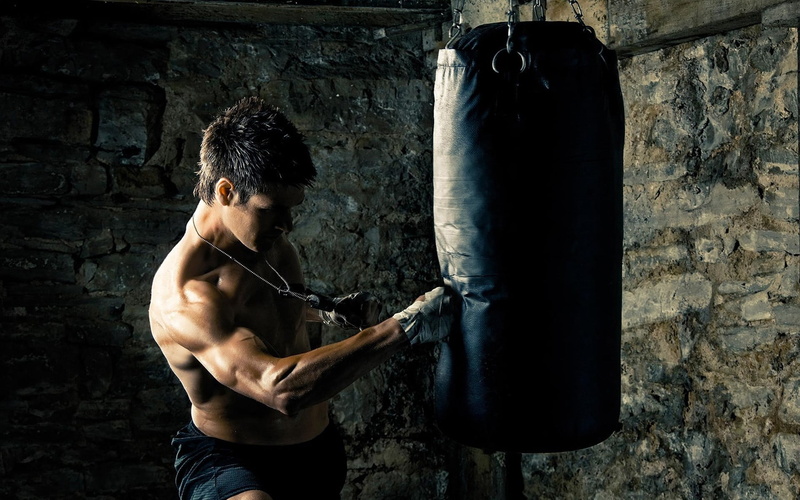 three quarter length, adult, one person, strength, healthy lifestyle, 1080P, young adult, wall - building feature, sport, boxer, arms raised, standing