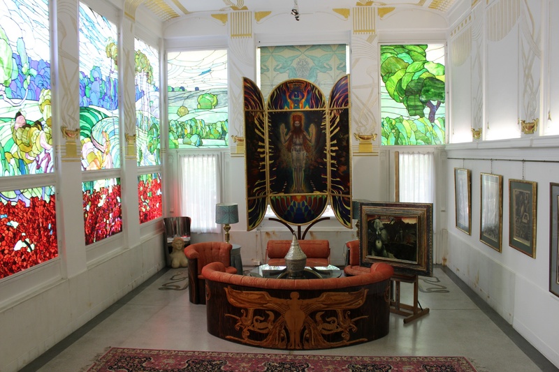 furniture, no people, ernst fuchs, seat, architecture, famous, art, built structure, home interior, landmark, floral pattern, building, domestic room, plant