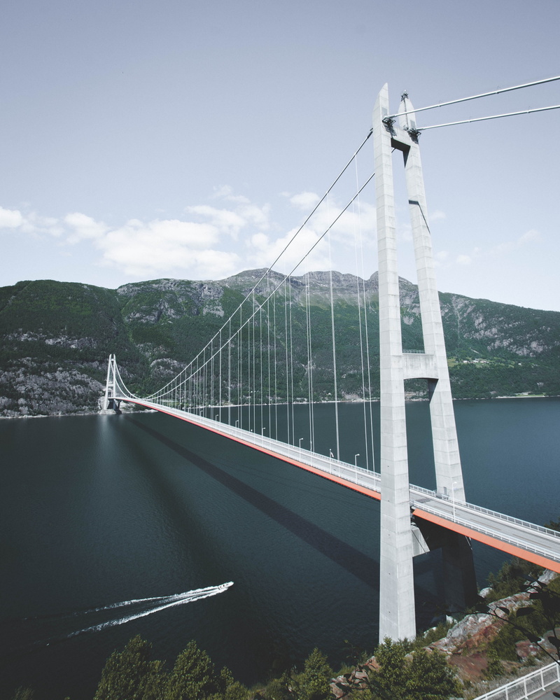 outdoors, travel, fjord, cloud - sky, green, two, sky, suspension, day, massive, connection, river, nature, travel destinations, landscape, mountain, bridge - man made structure