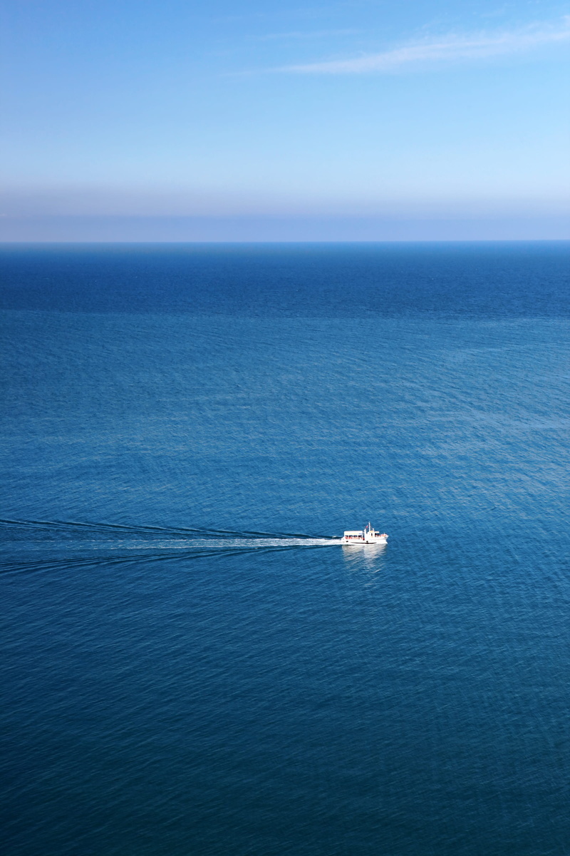 ocean, sailing, blue, day, tranquil scene, motion, nature, salt, large, surface, long, oil, mode of transportation, cargo, sky, sea, travel, waves, boat