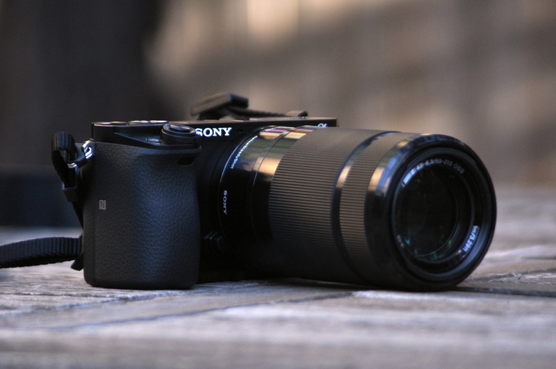 lens - eye, activity, slr camera, a6000, united states, no people, wood, 4K, copy space, creativity, dslr, photographing, black color, equipment, lens