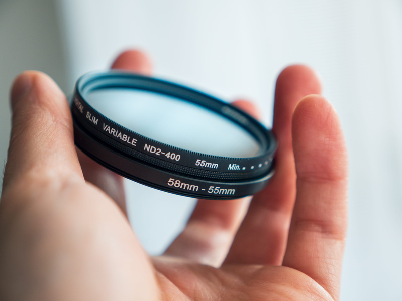 communication, people, modern, technology, filter, glass, detail, black color, photography themes, camera - photographic equipment, finger, lens - optical instrument
