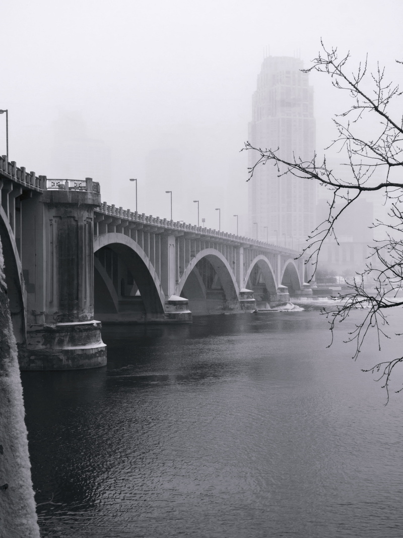 water, outdoors, snow, art, curves, old, arch, bridge - man made structure, united states, waterfront, lines, minneapolis, air pollution, landscape, bridge