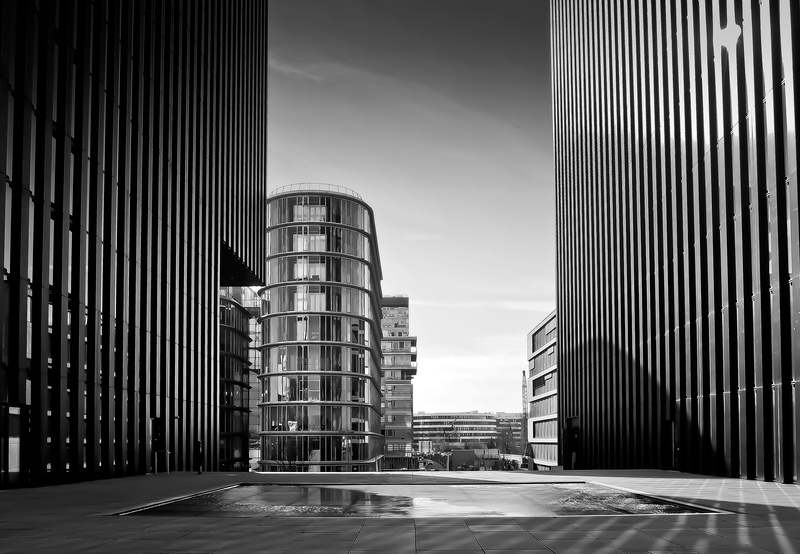 financial district, center, no people, city, rise, grayscale, cloud - sky, media harbour, outdoors, tower, skyscraper, town center, black white, cityscape