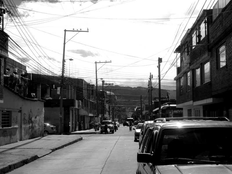 black white, colombia, motor vehicle, autos, built structure, human, transportation, homes, residential district, power supply, outdoors, car, civilization